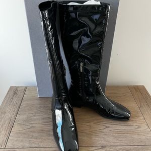 Never worn genuine patent leather, timeless boot that can be dressed up or down.